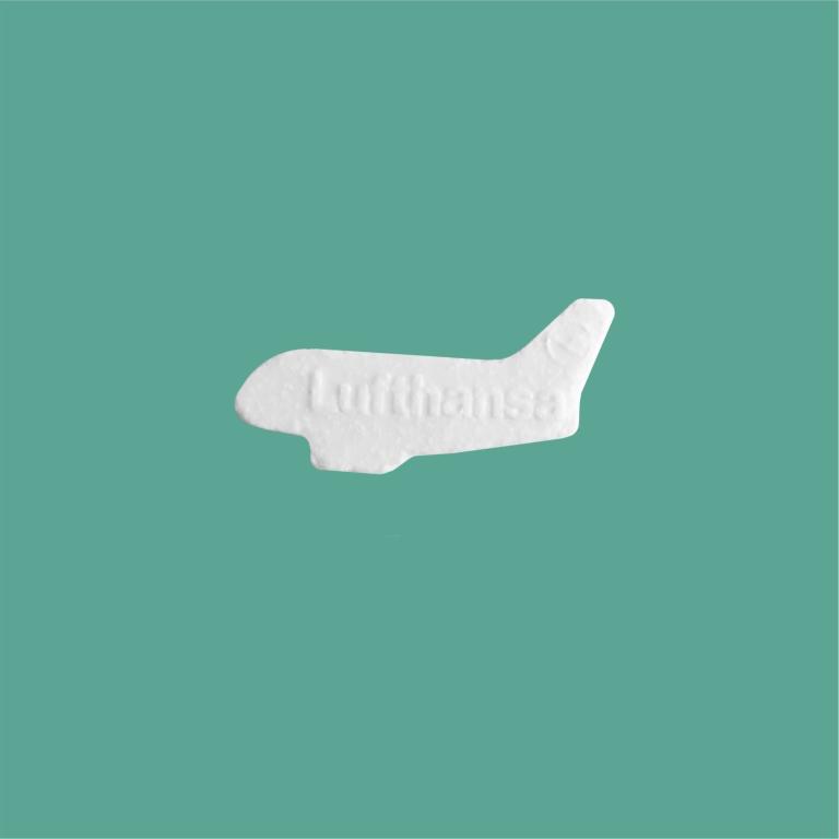 Plane shaped and embossed fresh breah mints with company logo